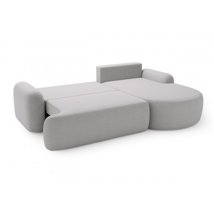 Elegantes hellgraues Ecksofa CLOUDY aus Lammfell mit abgerundeten Seiten und dekorativen kugelförmigen Polstern