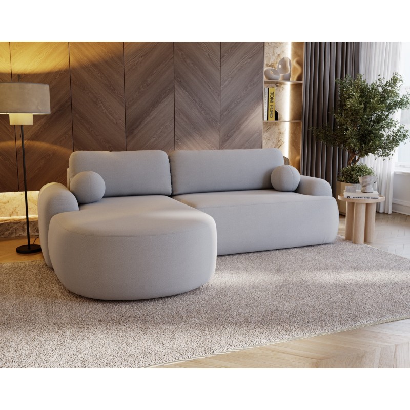 Elegantes hellgraues Ecksofa CLOUDY aus Lammfellstoff mit abgerundeten Seiten und dekorativen kugelförmigen Kissen 3/9