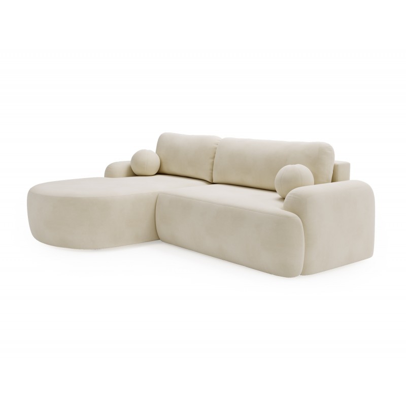 Elegante cremefarbene CLOUDY-Ecke links aus Veloursstoff mit abgerundeten Seiten und dekorativen kugelförmigen Kissen