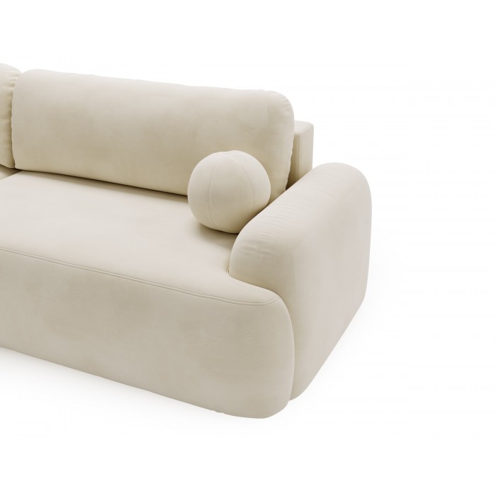 Elegante cremefarbene CLOUDY-Ecke links aus Veloursstoff mit abgerundeten Seiten und dekorativen kugelförmigen Kissen