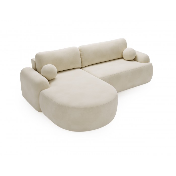 Elegante cremefarbene CLOUDY-Ecke links aus Veloursstoff mit abgerundeten Seiten und dekorativen kugelförmigen Kissen