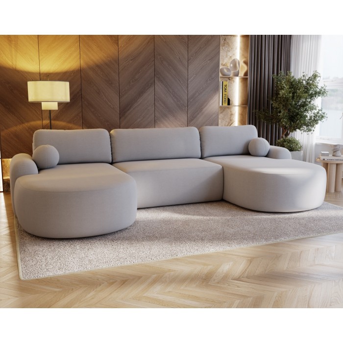 Elegantes hellgraues Ecksofa U CLOUDY aus Lammfellstoff mit abgerundeten Seiten und dekorativen kugelförmigen Kissen